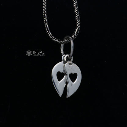 Handmade 925 Sterling silver broken heart pendant by TRIBAL ORNAMENTS, featuring a unique distressed heart design.