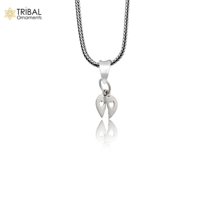 Handmade 925 Sterling silver broken heart pendant by TRIBAL ORNAMENTS featuring intricate tribal design.