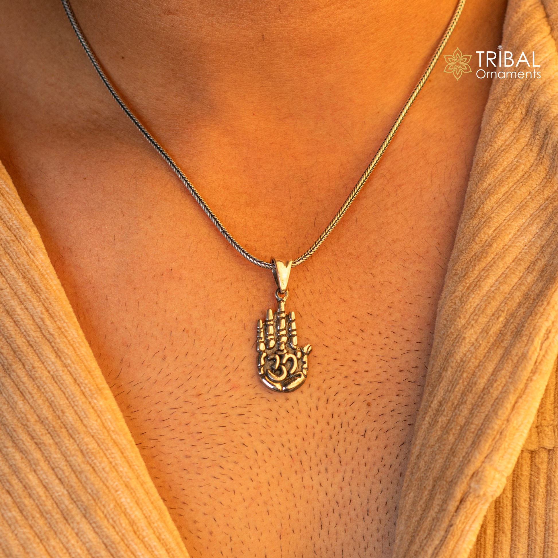 Sterling silver divine hand palm pendant with AUM design, unisex jewelry from TRIBAL ORNAMENTS, featuring intricate craftsmanship.