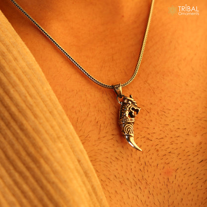 Handmade 925 sterling silver dragon tooth pendant by Tribal Ornaments, symbol of mythical power, wisdom, and resilience.