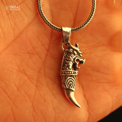 Handmade 925 sterling silver dragon tooth pendant by TRIBAL ORNAMENTS, featuring intricate mythical design symbolizing power and resilience.
