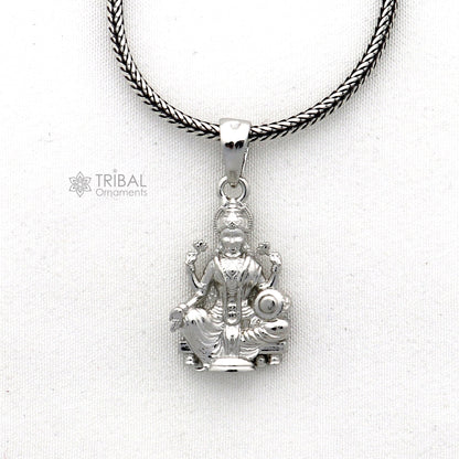 925 sterling silver Maha Lakshmi goddess pendant by TRIBAL ORNAMENTS, featuring intricate handmade divine jewelry design.