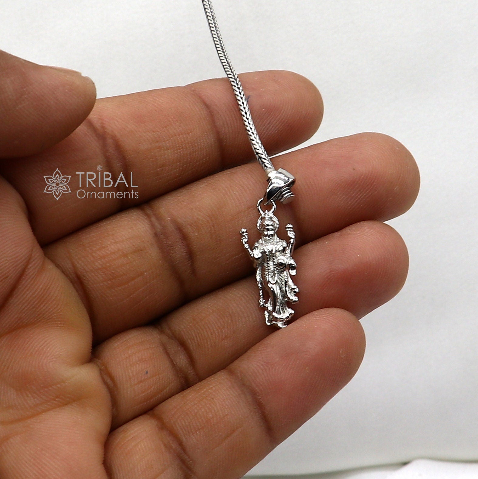 Unisex 925 sterling silver Goddess Maha Lakshmi pendant featuring intricate handmade tribal design, divine Lakshmi Maa jewelry.