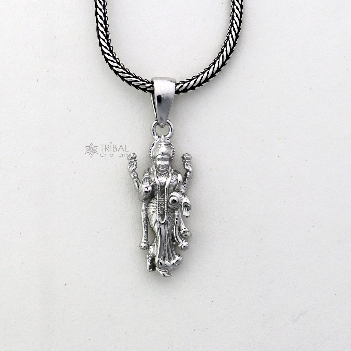Sterling silver Goddess Maha Lakshmi pendant, handmade unisex jewelry by TRIBAL ORNAMENTS featuring divine Lakshmi Maa design.