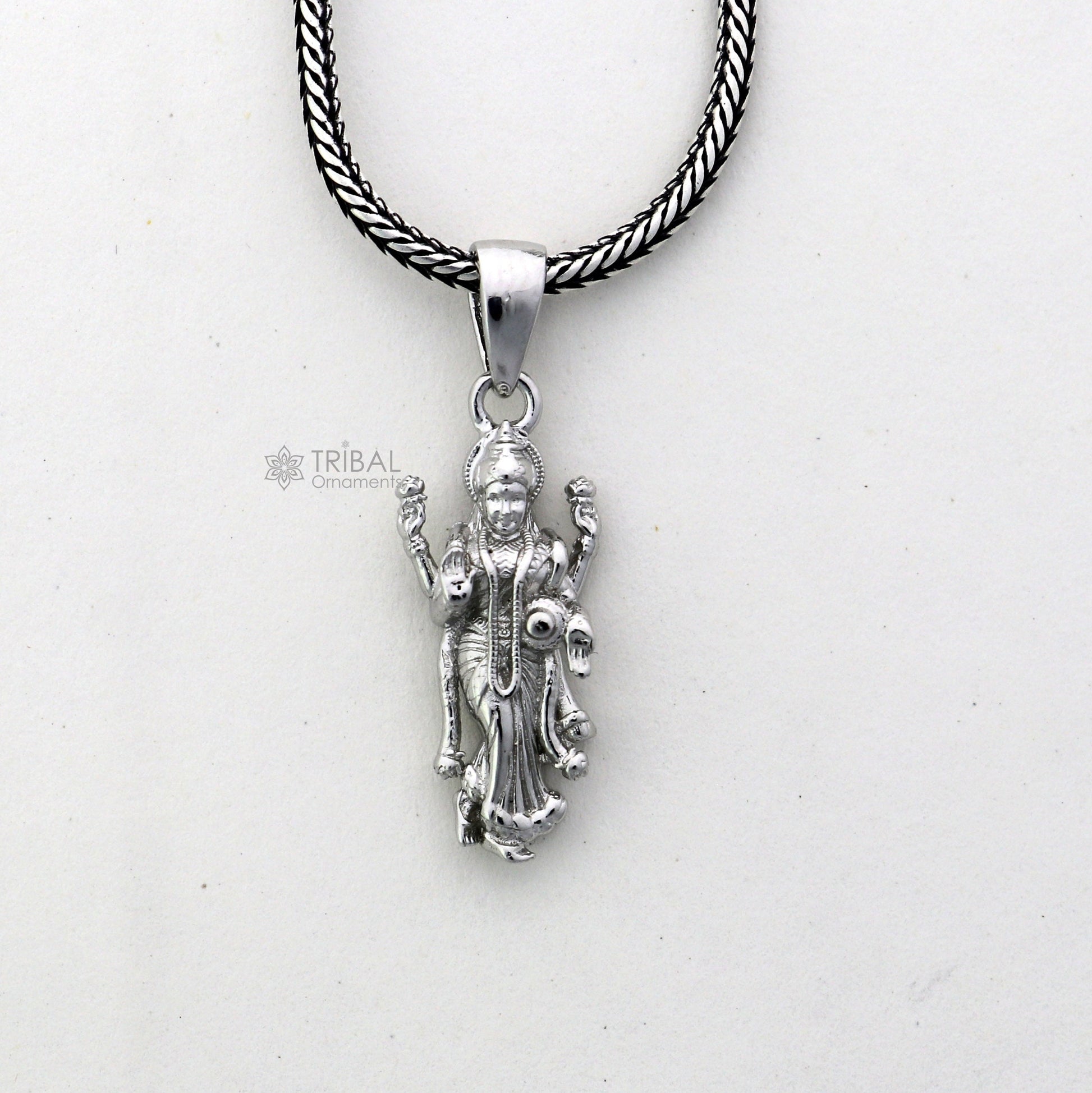 Sterling silver Goddess Maha Lakshmi pendant, handmade unisex jewelry by TRIBAL ORNAMENTS featuring divine Lakshmi Maa design.
