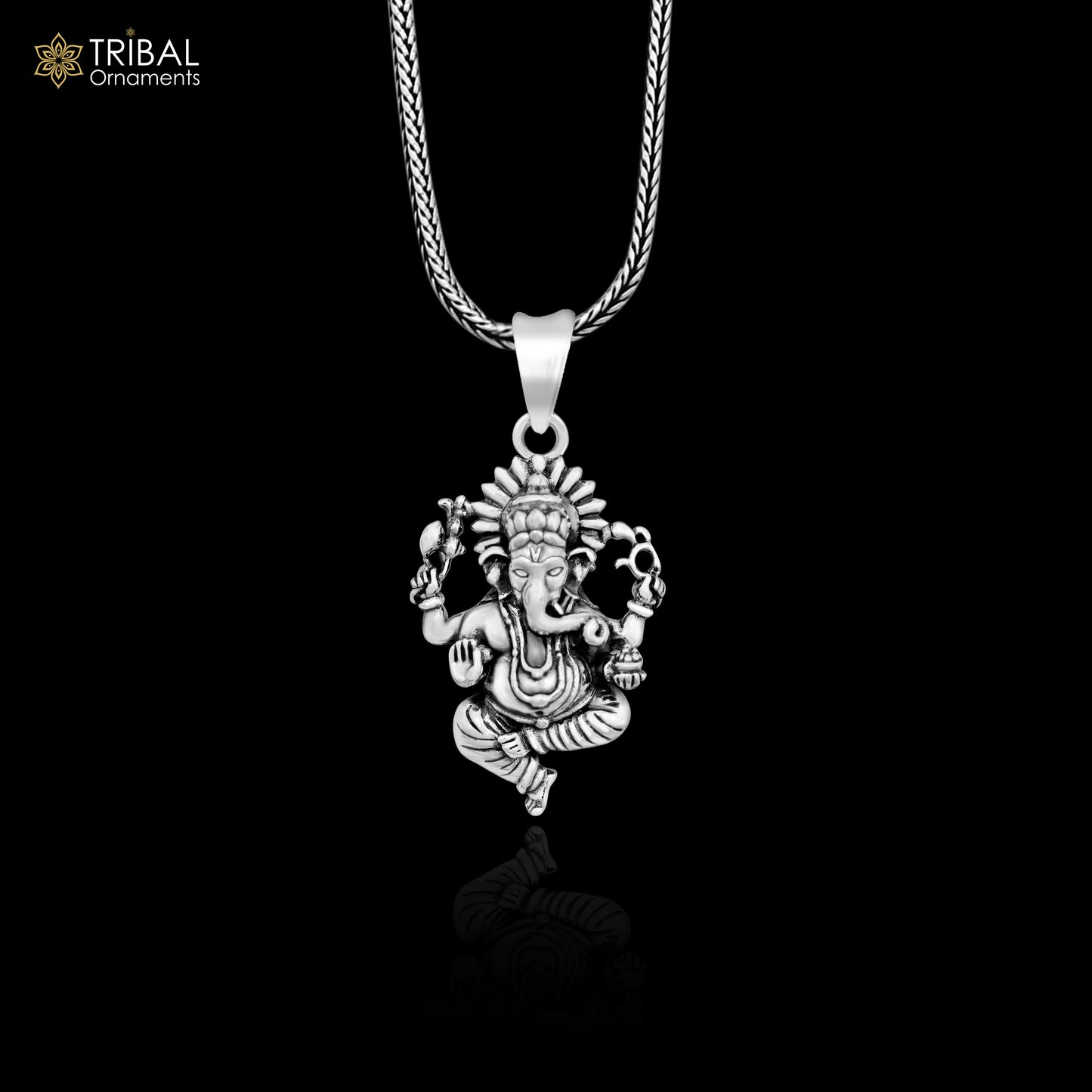 Sterling silver Lord Ganesha pendant by Tribal Ornaments, handcrafted unisex jewelry with intricate tribal design.