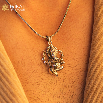Sterling silver Lord Ganesha pendant from TRIBAL ORNAMENTS, handmade unisex jewelry with intricate tribal design.