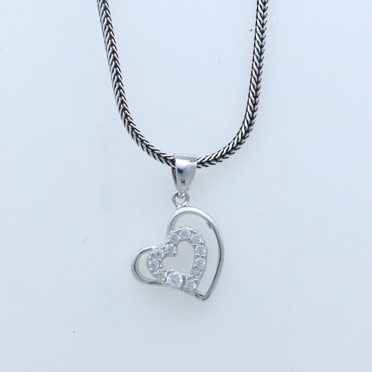 Handmade 925 sterling silver heart pendant with tribal ornament design, crafted by TRIBAL ORNAMENTS.