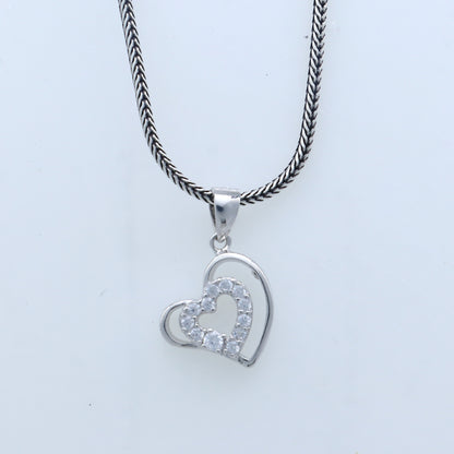 Handmade 925 sterling silver heart pendant with tribal ornament design, crafted by TRIBAL ORNAMENTS.