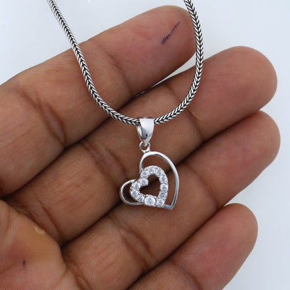Handmade 925 sterling silver heart pendant by Tribal Ornaments, detailed tribal-inspired design for elegant jewelry.