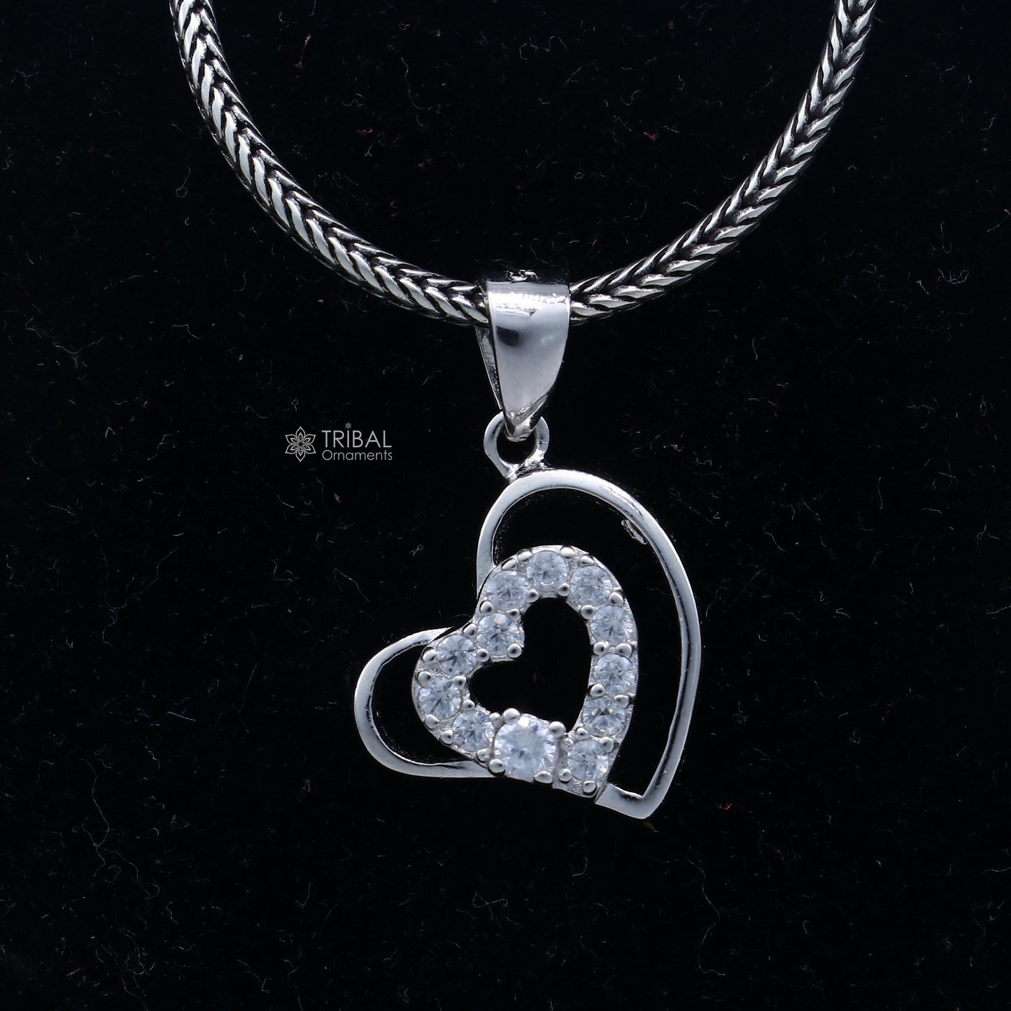 Handmade 925 sterling silver heart pendant with tribal ornament design, crafted by TRIBAL ORNAMENTS.