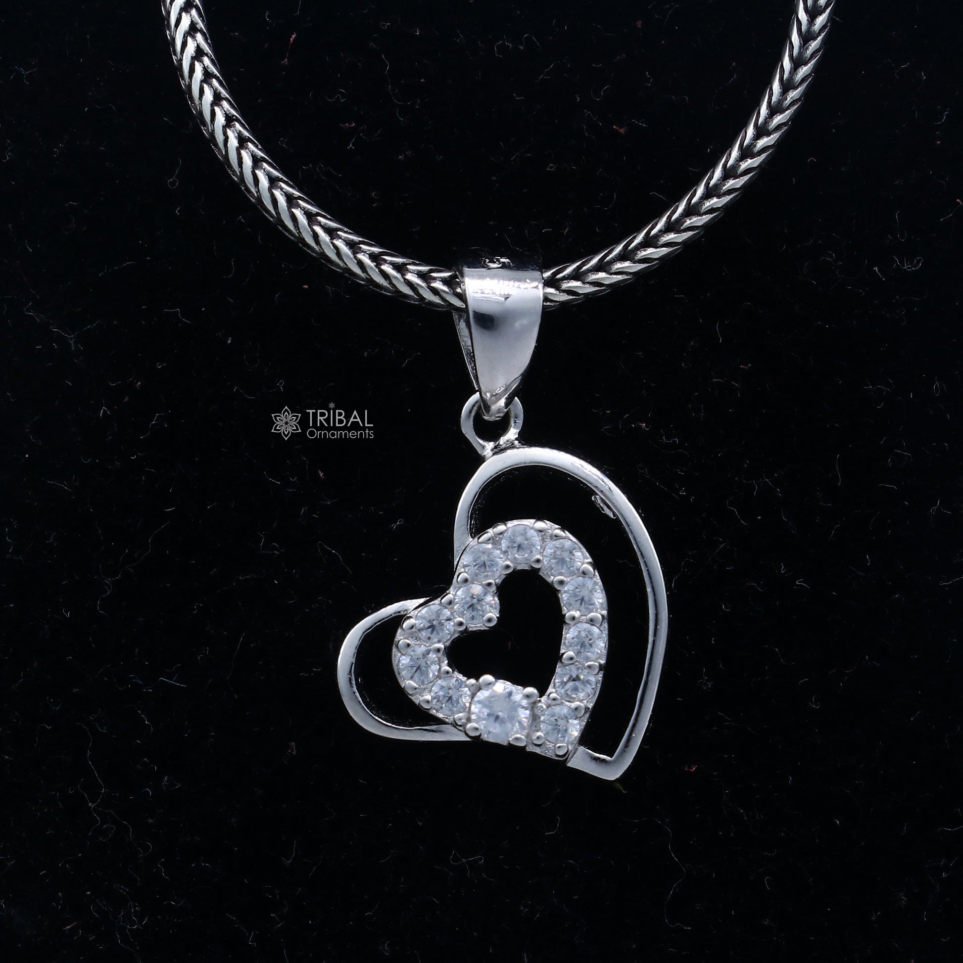 Handmade 925 sterling silver heart pendant with tribal ornament design, crafted by TRIBAL ORNAMENTS.