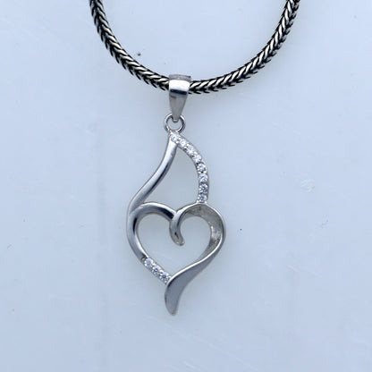 Handmade 925 sterling silver pendant with a heart design by TRIBAL ORNAMENTS, showcasing intricate tribal-inspired craftsmanship.
