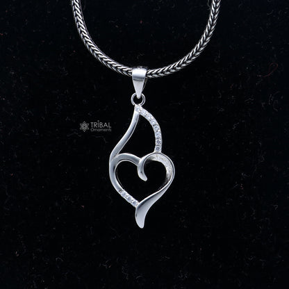 Handmade 925 Sterling silver heart pendant with tribal design from TRIBAL ORNAMENTS, featuring intricate craftsmanship.