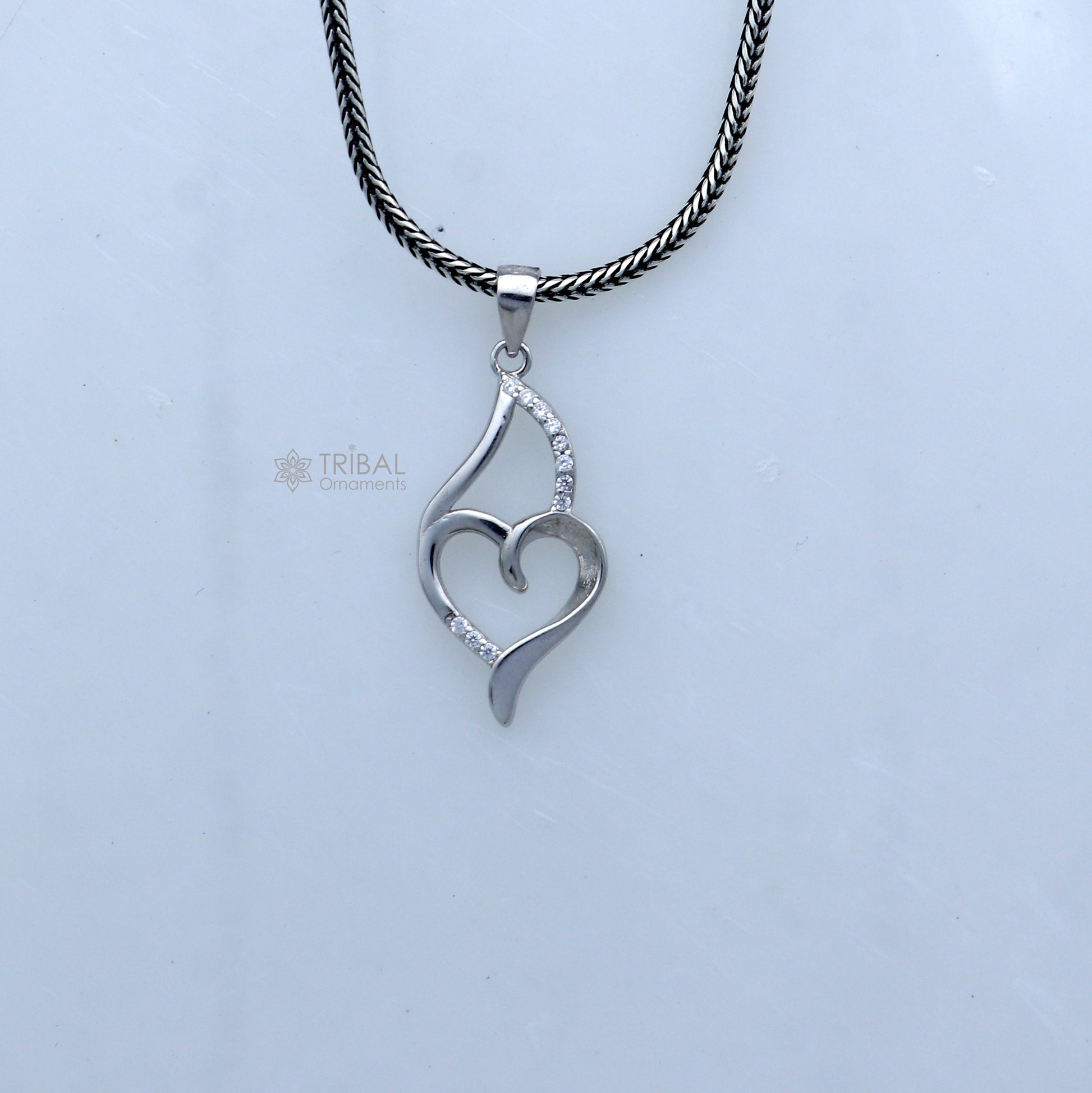 Handmade 925 sterling silver heart pendant with tribal ornament design, crafted by TRIBAL ORNAMENTS.