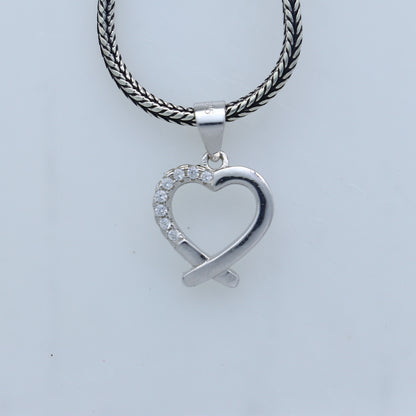Handmade 925 sterling silver heart pendant with tribal ornament design, crafted by TRIBAL ORNAMENTS.