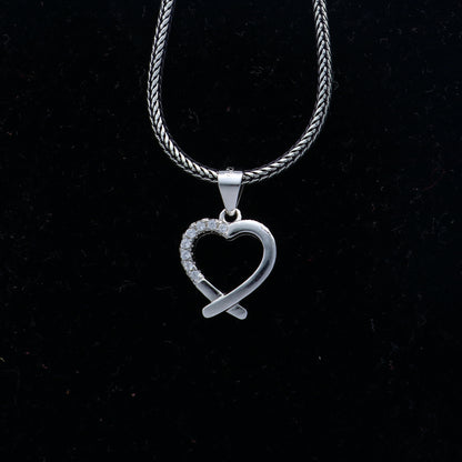 Handmade 925 sterling silver heart pendant with tribal ornament design, crafted by TRIBAL ORNAMENTS.