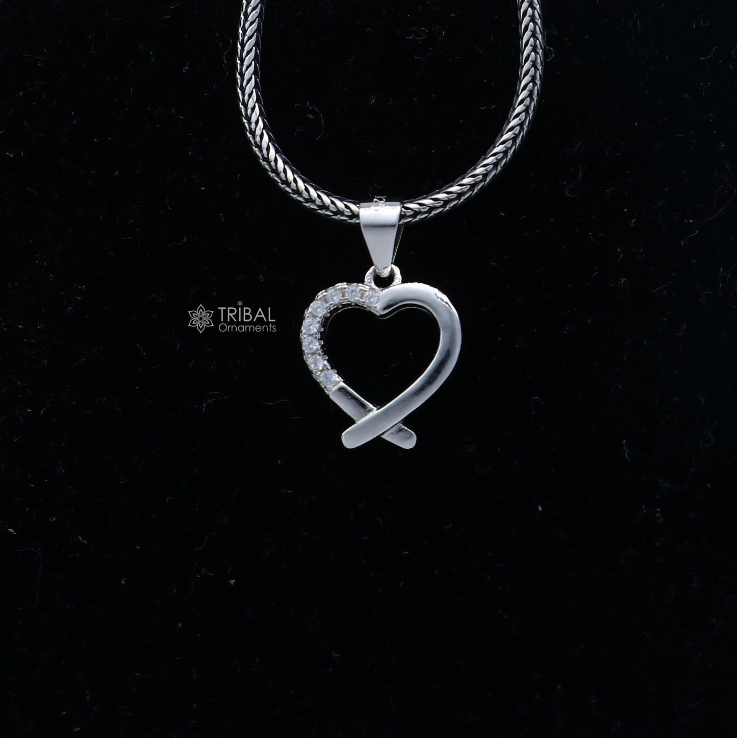 Handmade 925 sterling silver heart pendant with tribal ornament design, crafted by TRIBAL ORNAMENTS.