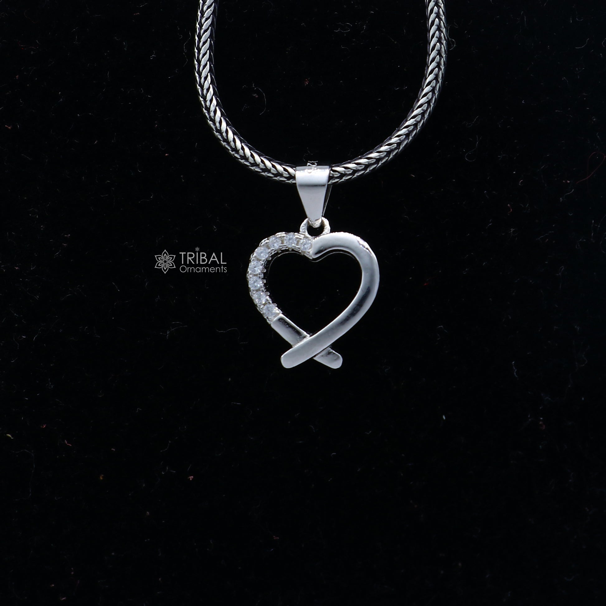 Handmade 925 sterling silver heart pendant with tribal ornament design, crafted by TRIBAL ORNAMENTS.