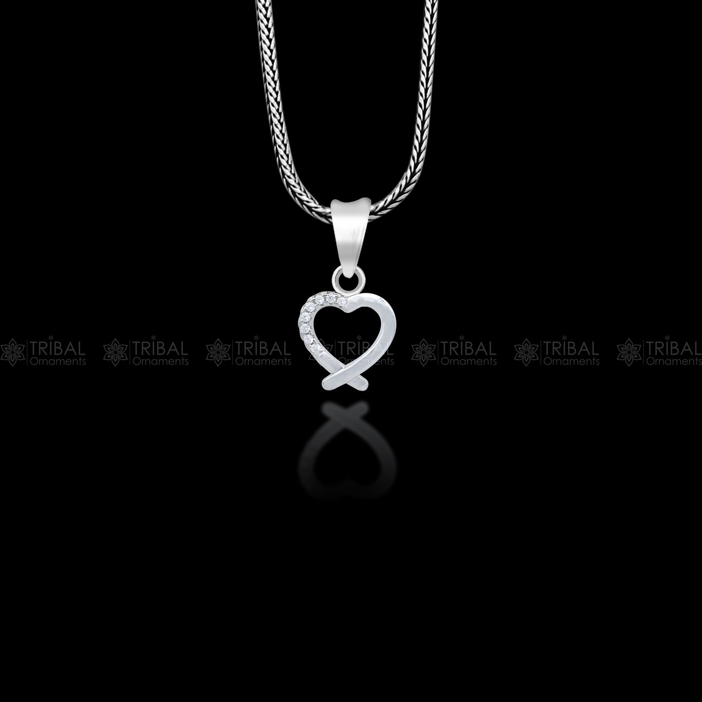 Handmade 925 sterling silver heart pendant with tribal ornament design, crafted by TRIBAL ORNAMENTS.