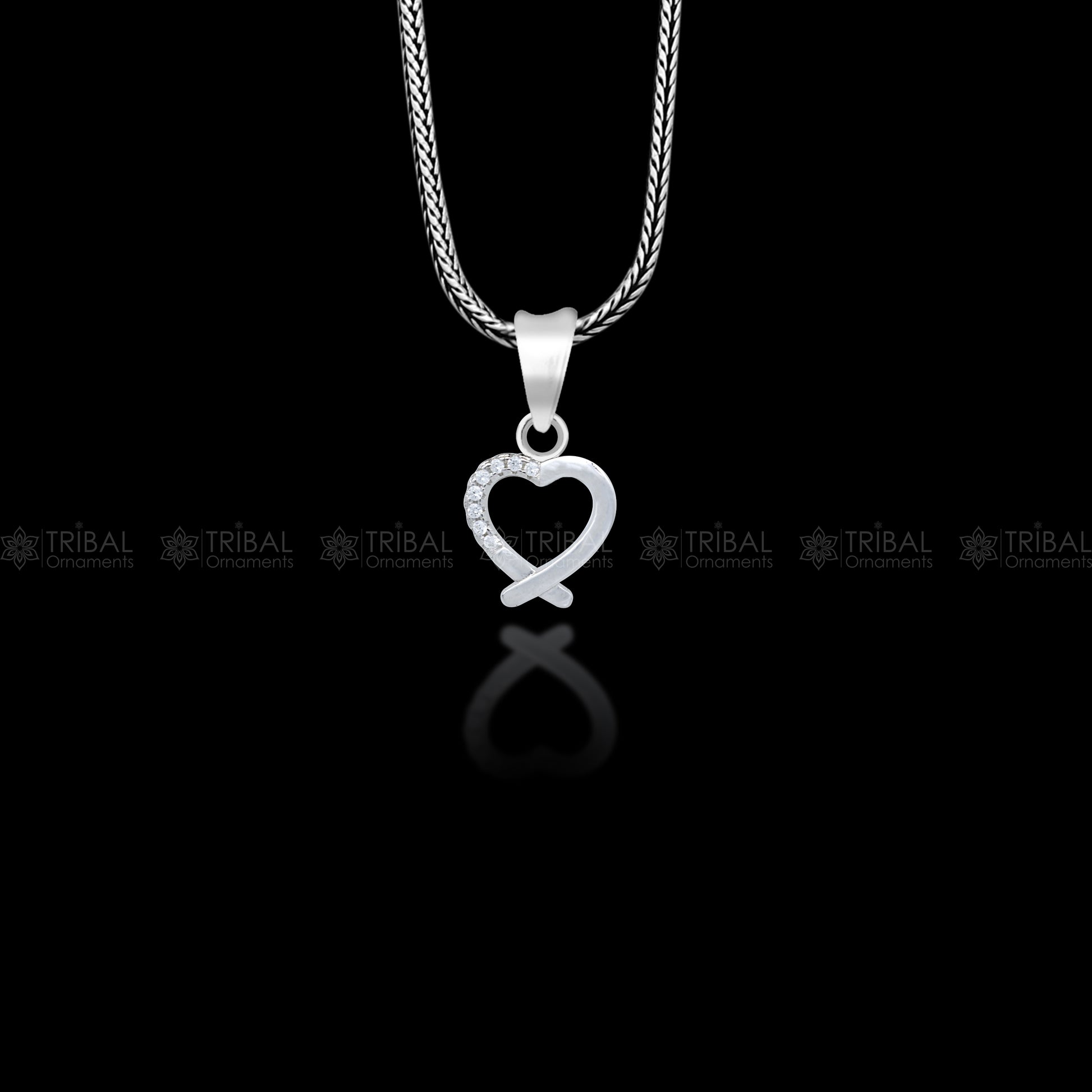 Handmade 925 sterling silver heart pendant with tribal ornament design, crafted by TRIBAL ORNAMENTS.