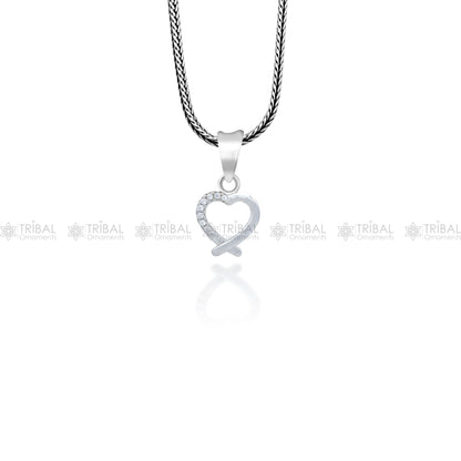Handmade 925 sterling silver heart pendant with tribal design, crafted by TRIBAL ORNAMENTS, showcasing intricate silver craftsmanship.