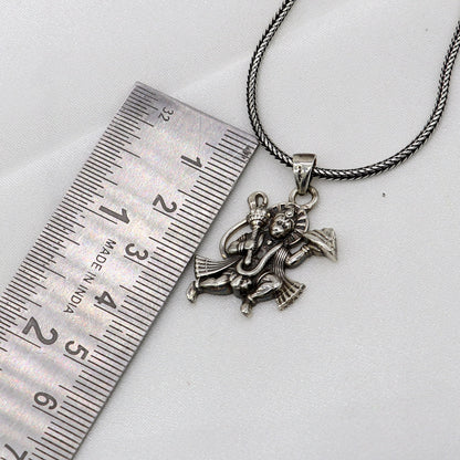 Sterling silver handmade Hindu Lord Hanuman flying pendant, divine Lord Bajarangbali jewelry, intricate tribal ornament design.