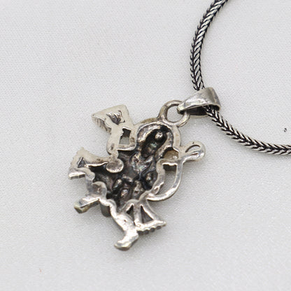 Sterling silver handmade Hindu Lord Hanuman flying pendant, divine Lord Bajarangbali, detailed spiritual jewelry by TRIBAL ORNAMENTS.