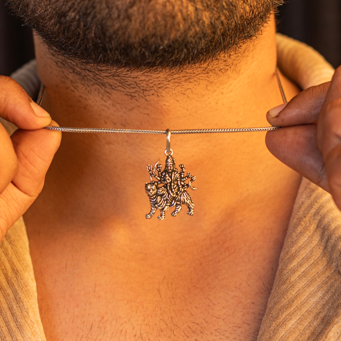 Sterling silver handmade Lord Durga Maa pendant by TRIBAL ORNAMENTS, featuring a detailed, stylish tribal design.