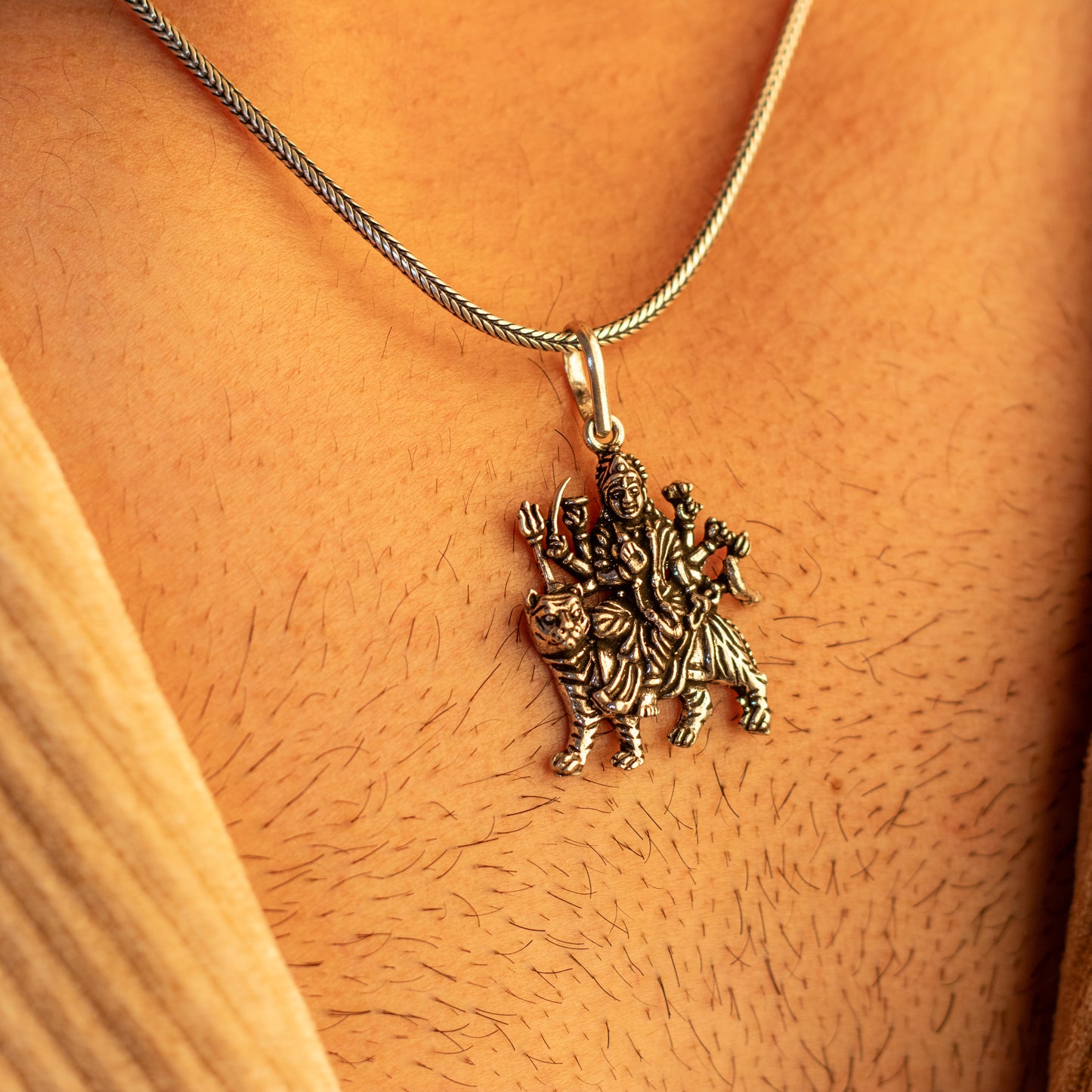 Sterling silver handmade Lord Durga Maa pendant by TRIBAL ORNAMENTS featuring a stylish, detailed tribal design.