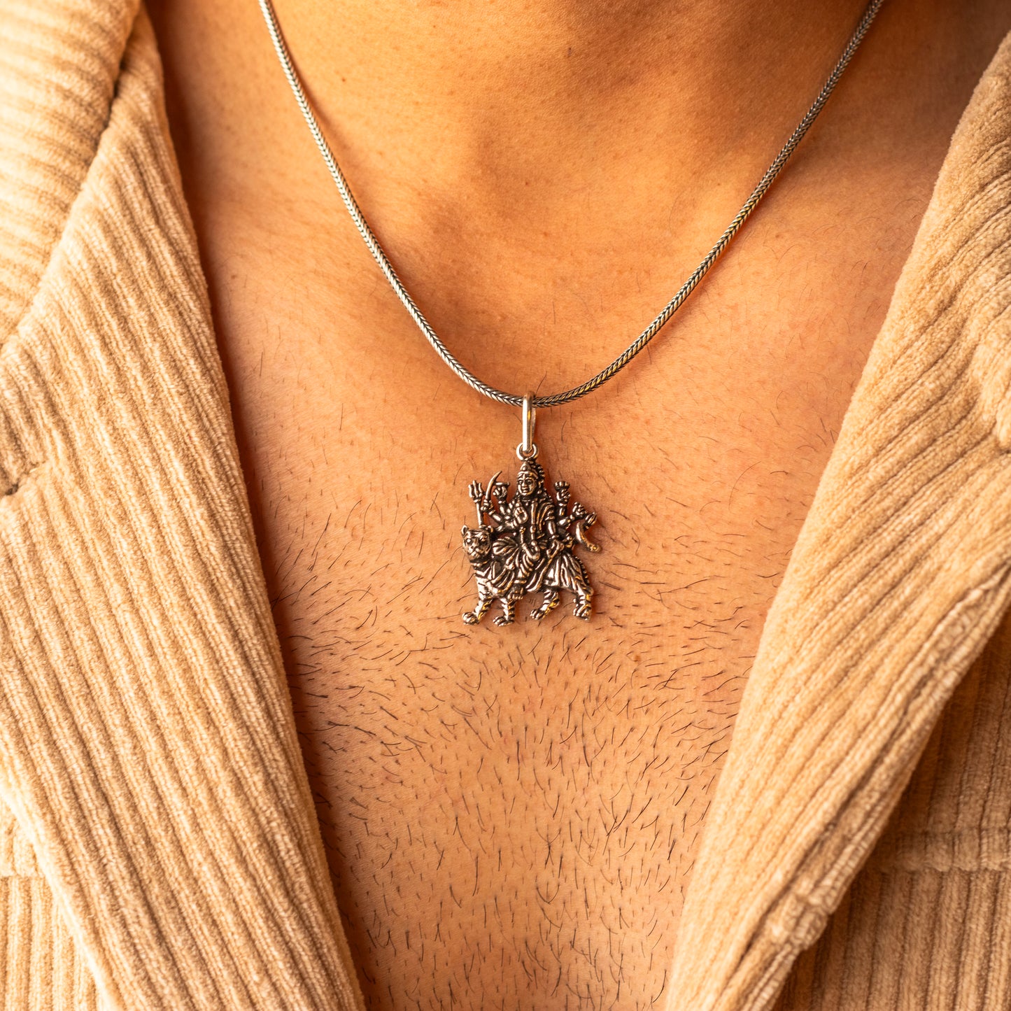 Sterling silver handmade Lord Durga Maa pendant from TRIBAL ORNAMENTS, featuring a stylish and detailed divine design.