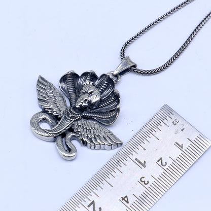 Sterling silver Lord Kalla Ji deity snake pendant by TRIBAL ORNAMENTS featuring intricate handmade design and religious symbolism.