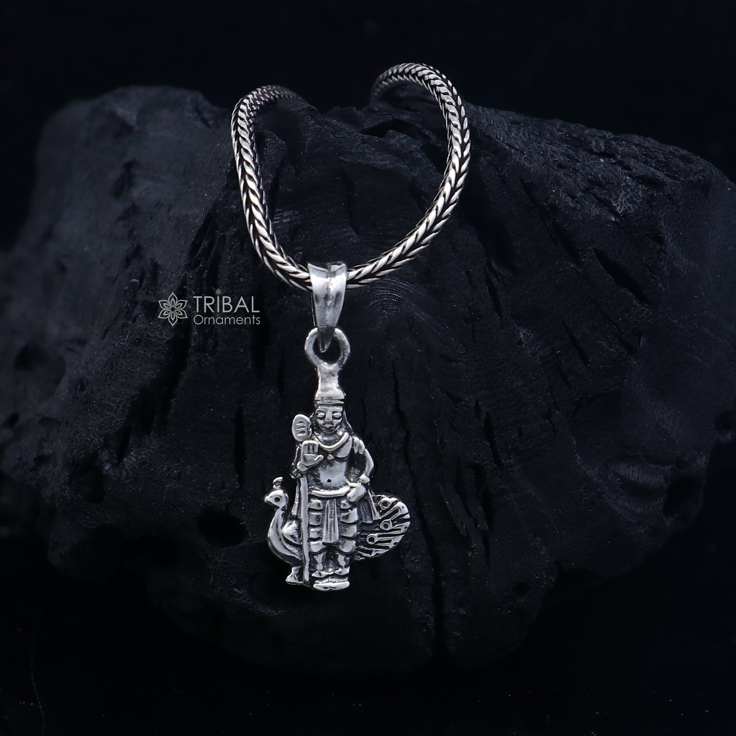 Handmade 925 sterling silver Lord Kartikey pendant from Tribal Ornaments featuring intricate tribal design.