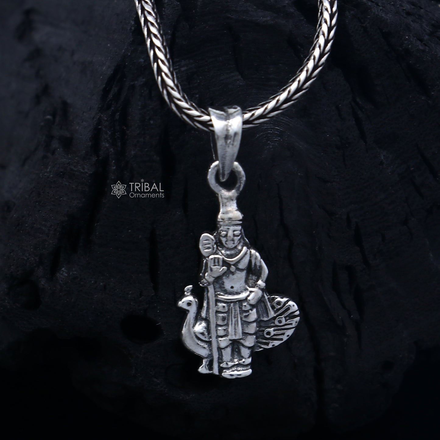 Handmade 925 Sterling silver Lord Kartikey pendant by Tribal Ornaments, featuring detailed tribal design and religious symbolism.