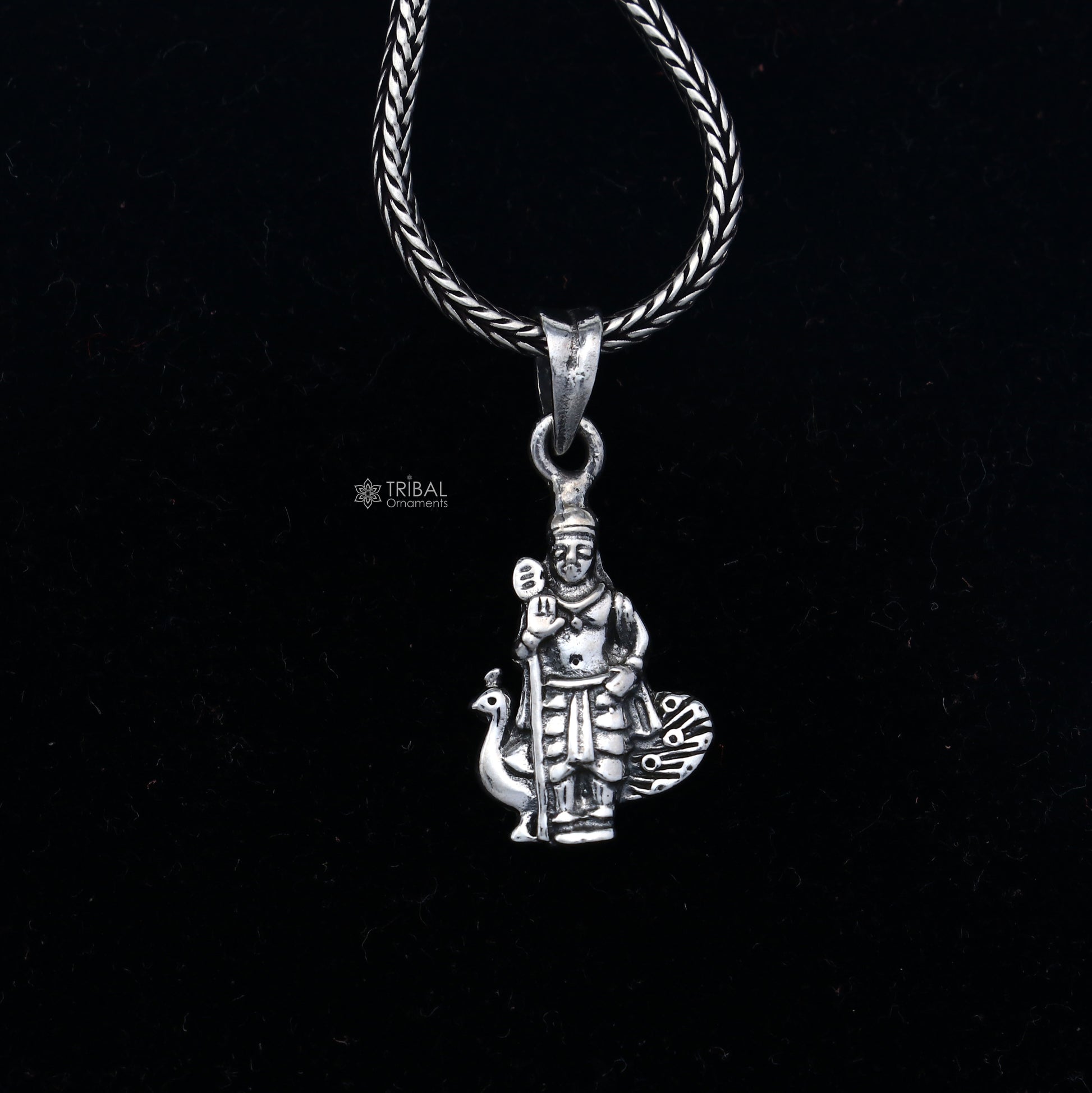 Handmade 925 Sterling silver Lord Kartikey pendant by Tribal Ornaments showing intricate tribal design and detailed craftsmanship.