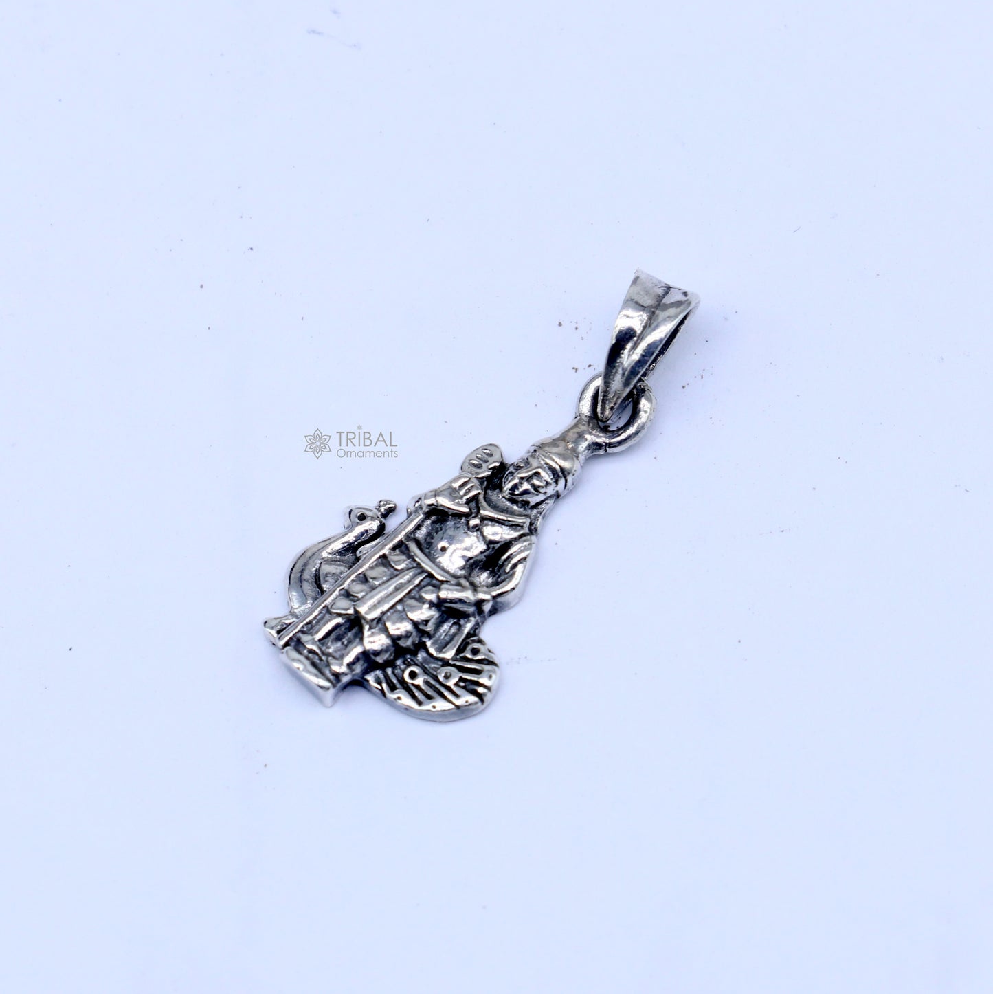 Handmade 925 sterling silver Lord Kartikey pendant with intricate tribal design, crafted by Tribal Ornaments.