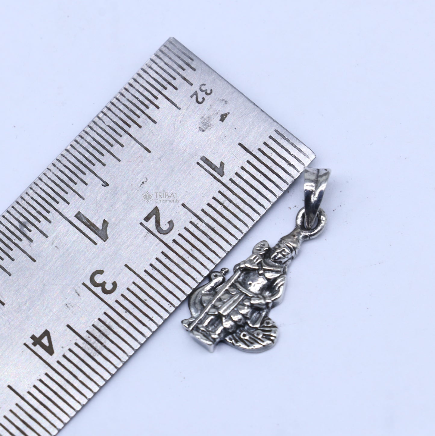 Handmade 925 sterling silver Lord Kartikey pendant by TRIBAL ORNAMENTS, detailed tribal-style design for spiritual jewelry.