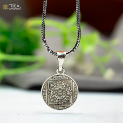Handmade 925 sterling silver Maha Mrityunjay Yantram pendant with chain, tribal jewelry style, detailed silver tribal ornament.