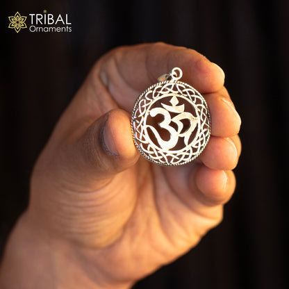 Sterling silver 'Aum' OM pendant by TRIBAL ORNAMENTS, unisex handmade jewelry featuring a stylish mantra symbol.