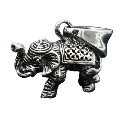 Small 925 sterling silver elephant pendant from TRIBAL ORNAMENTS, handmade jewelry, perfect for gifting or lucky charm necklaces.