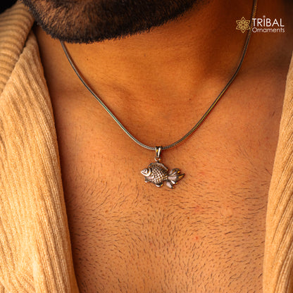 Sterling silver fish pendant by Tribal Ornaments featuring a stylish handmade design, perfect for custom jewelry and gifting.