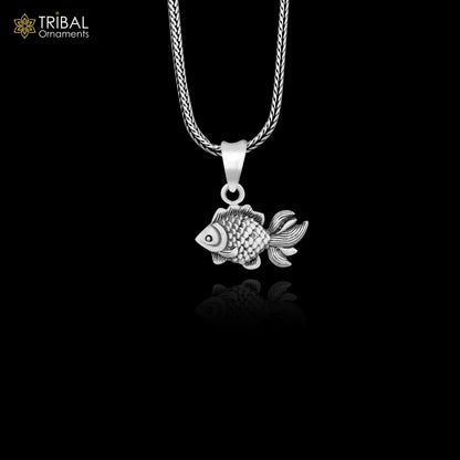 Sterling silver fish pendant by TRIBAL ORNAMENTS, handmade stylish jewelry with religious and custom design details.