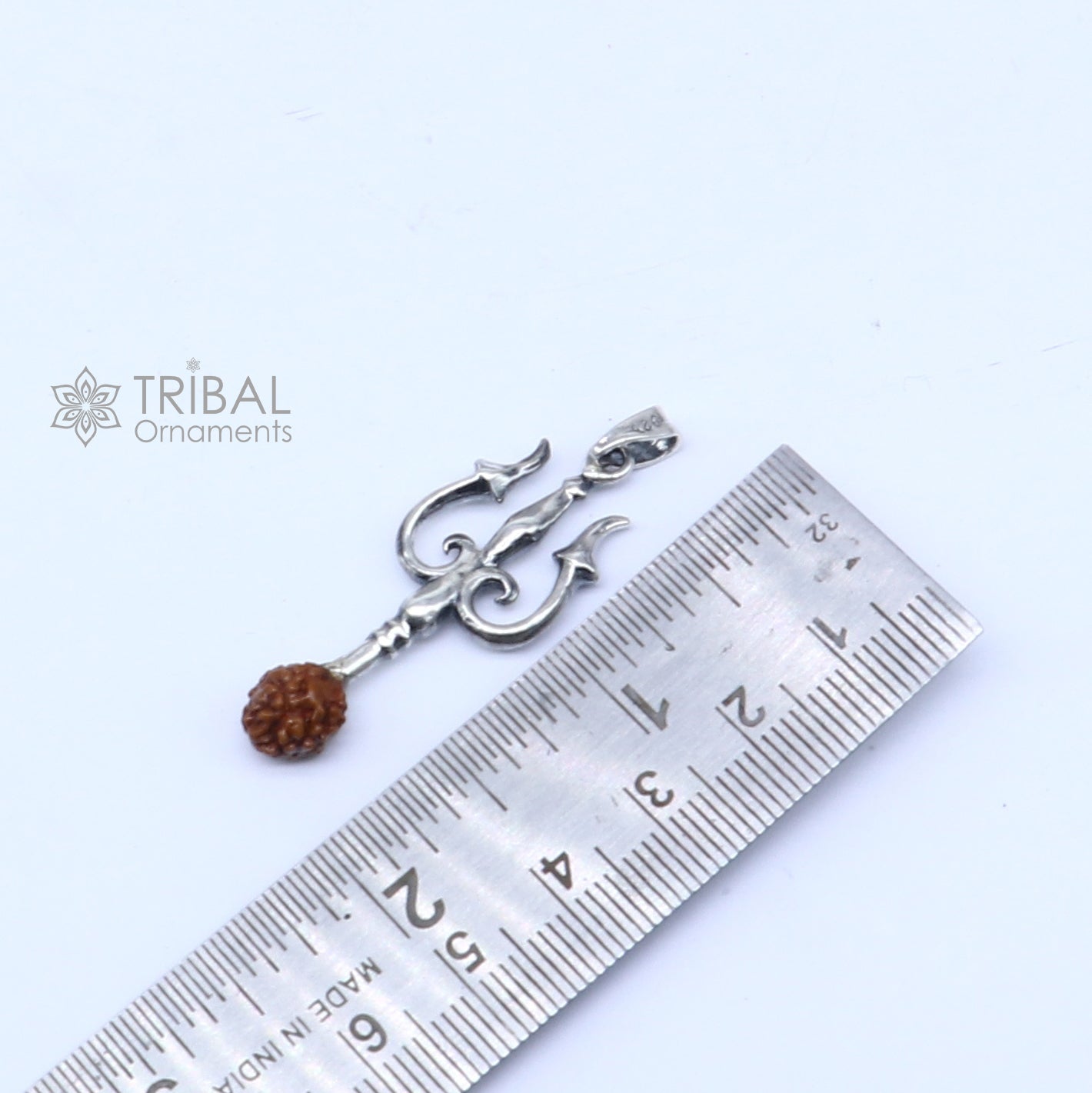 Handmade 925 sterling silver Trishul pendant with Rudraksha bead, tribal ornaments style, featuring a detailed trident design.