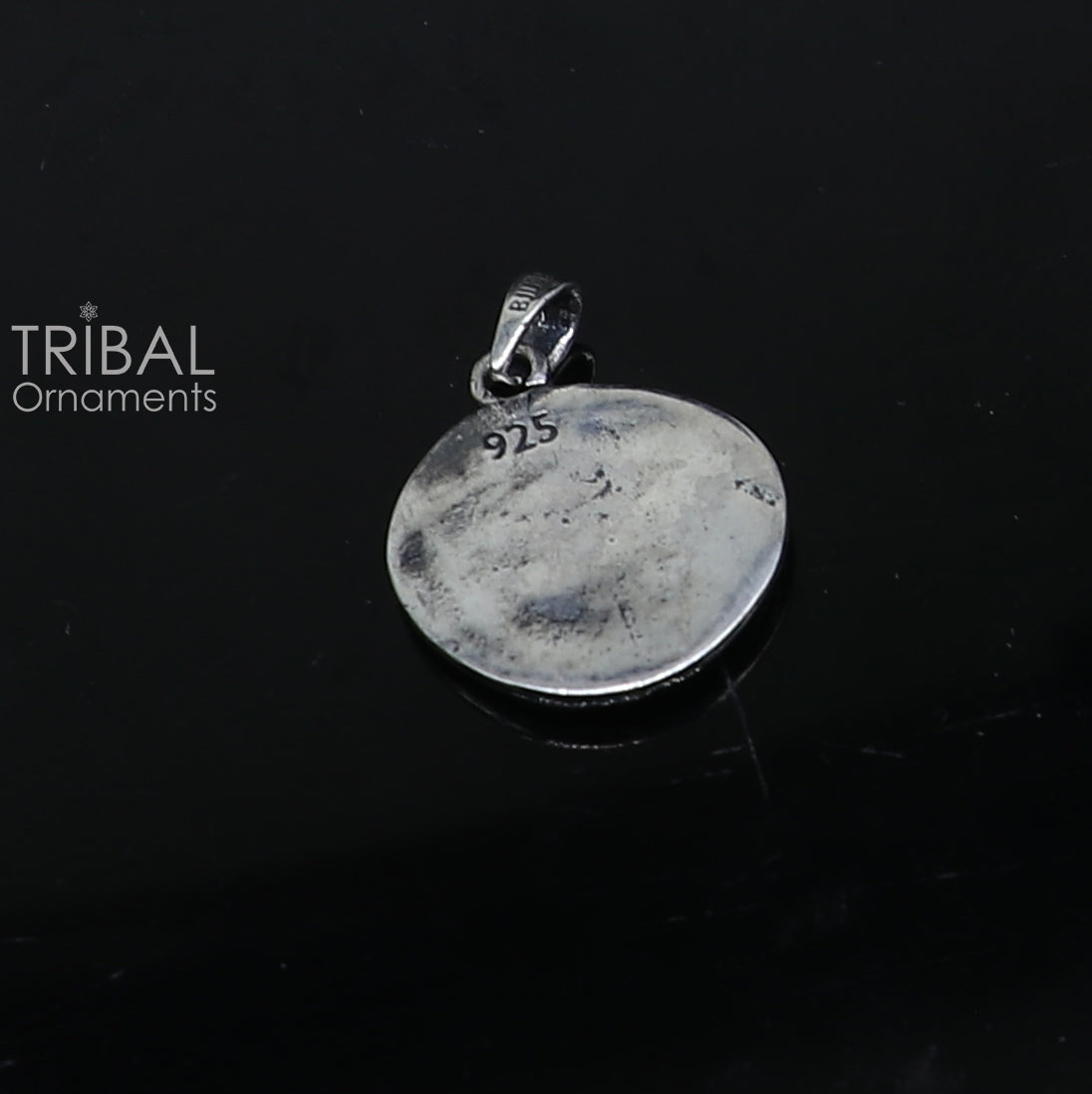 925 Sterling silver Artemis charm pendant with a unique handmade tribal design by TRIBAL ORNAMENTS.