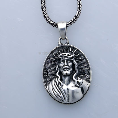 Handmade 925 sterling silver men's Jesus pendant with unique tribal design, showcasing detailed craftsmanship and spiritual symbolism.