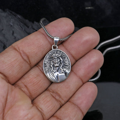 Handmade 925 Sterling silver men's Jesus pendant with unique tribal design by TRIBAL ORNAMENTS.