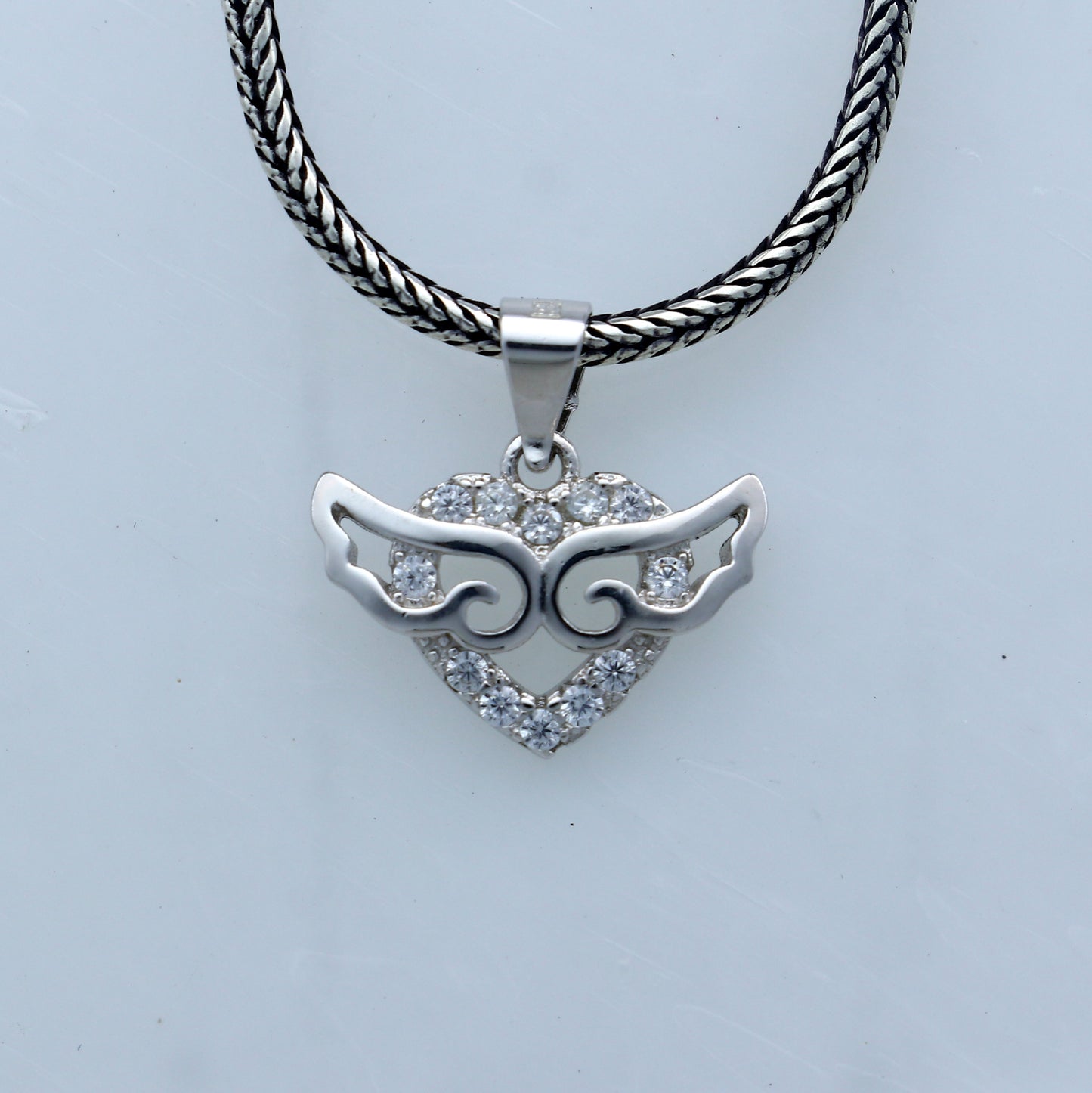 Handmade 925 sterling silver pendant with unique tribal design, crafted by TRIBAL ORNAMENTS.