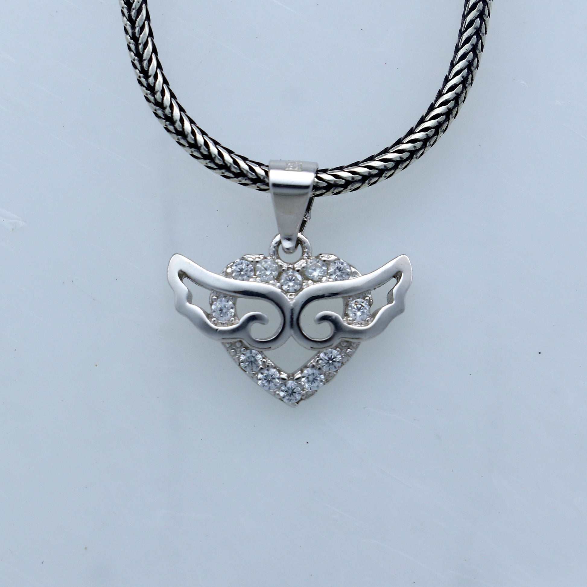 Handmade 925 sterling silver pendant with unique tribal design, crafted by TRIBAL ORNAMENTS.