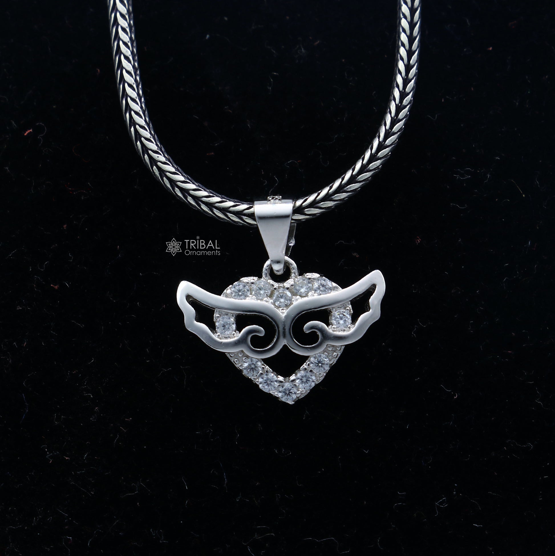 Handmade 925 sterling silver pendant with a unique tribal-inspired design by TRIBAL ORNAMENTS.