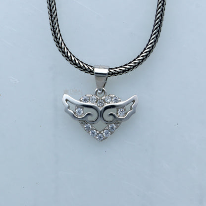 925 Sterling silver handmade pendant with unique tribal design by TRIBAL ORNAMENTS, featuring intricate craft details.